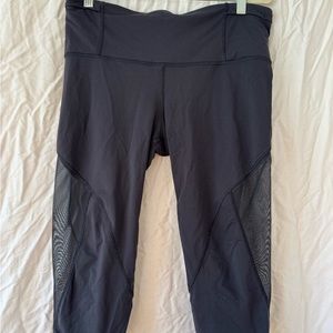 Lululemon cropped black leggings with pocket and mesh detail
